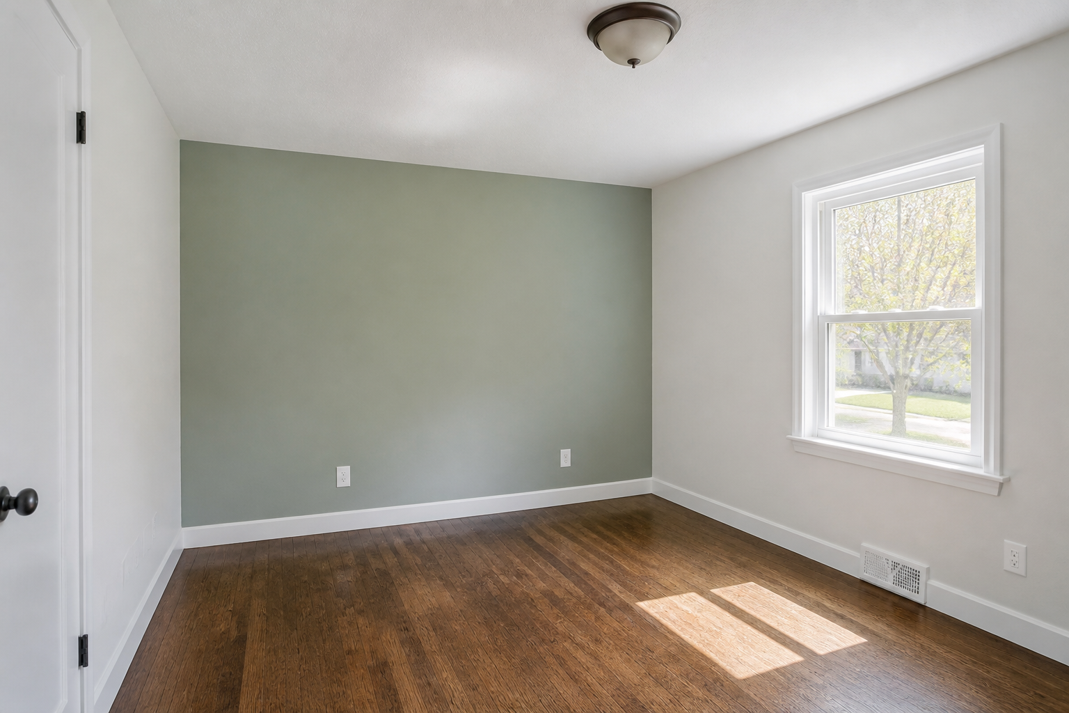 Residential bedroom interior painting with an accent wall in Grand Island, NE Residential bedroom interior painting with an accent wall in Grand Island, NE